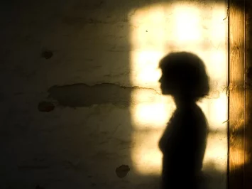 Silhouette of a person’s shadow, symbolizing exploring the unconscious in Jungian analysis with Susanna Wright